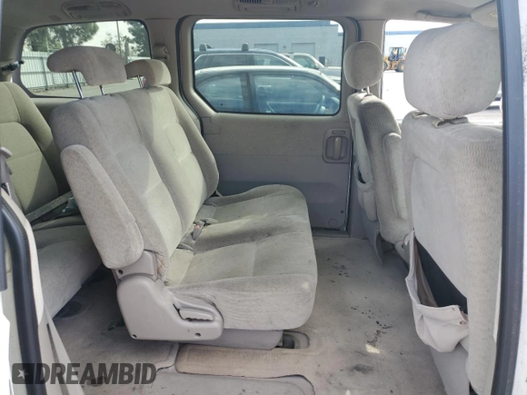 2005 Kia Sedona LX with VIN KNDUP132356623195, listed as a Copart auction lot 46623545 with 173,049 mi miles and Salvage Title. Bid and sale history available at carsss.com. Image 11.