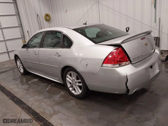2013 Chevrolet Impala LTZ with VIN 2G1WC5E37D1241848, listed as a IAAI auction lot 41863719 with 167,482 mi miles. Bid and sale history available at carsss.com. Image 3.