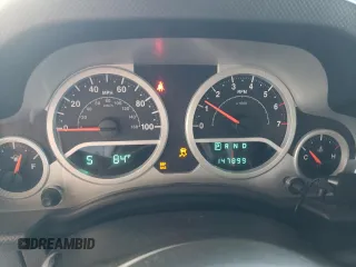 2010 Jeep Wrangler Unlimited Rubicon with VIN 1J4BA6H18AL197855, listed as a Copart auction lot 57748185 with 147,899 mi miles and Salvage title. Bid and sale history available at DreamBid. Image 9.