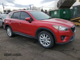 2014 Mazda CX-5 Grand Touring with VIN JM3KE4DY5E0360896, listed as a Copart auction lot 43978975 with 113,942 mi miles and Salvage Title. Bid and sale history available at carsss.com. Image 4.