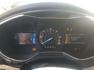 2013 Ford Fusion SE Hybrid z VIN 3FA6P0LU7DR368711, wystawiony jako Copart lot #62367685 z przebiegiem 155 284 mil mil oraz Czysty tytuł • Clean title. Historia ofert i sprzedaży dostępna na DreamBid. Obrazek 9.