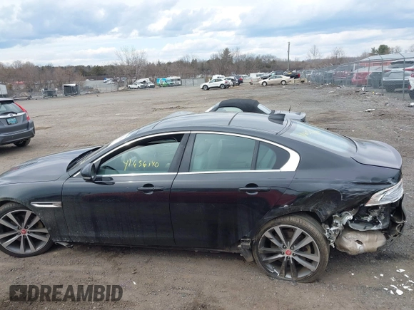 2017 Jaguar XE 25t Prestige with VIN SAJAE4BG5HA963099, listed as a IAAI auction lot 41656140 with 123,863 mi miles. Bid and sale history available at carsss.com. Image 14.