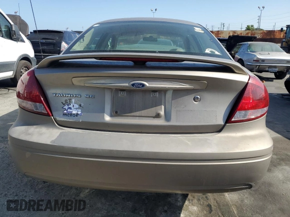 2005 Ford Taurus SE z VIN 1FAFP53215A212736, wystawiony jako Copart lot #58439495 z przebiegiem Nie podano mil oraz Szkoda całkowita • Salvage title. Historia ofert i sprzedaży dostępna na DreamBid. Obrazek 6.