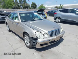 2003 Mercedes-Benz E-Class 3.2L with VIN WDBUF65JX3A236768, listed as a IAAI auction lot 42094824 with 251,896 mi miles. Bid and sale history available at carsss.com. Image 6.