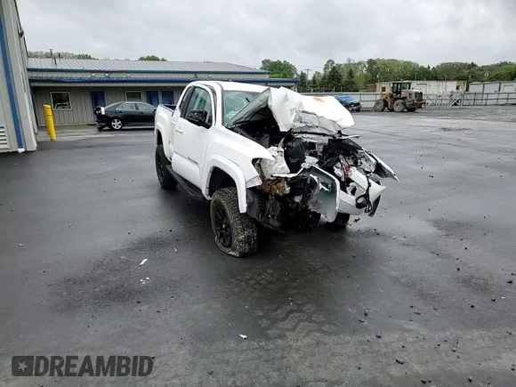2020 Toyota Tacoma SR5 z VIN 3TMCZ5AN2LM339564, wystawiony jako Copart lot #57871255 z przebiegiem Nie podano mil oraz Szkoda całkowita • Salvage title. Historia ofert i sprzedaży dostępna na DreamBid. Obrazek 12.