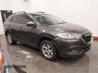 2015 Mazda CX-9 Sport with VIN JM3TB2BA1F0453620, listed as a IAAI auction lot 41330887 with 119,219 mi miles and . Bid and sale history available at carsss.com. Image 1.