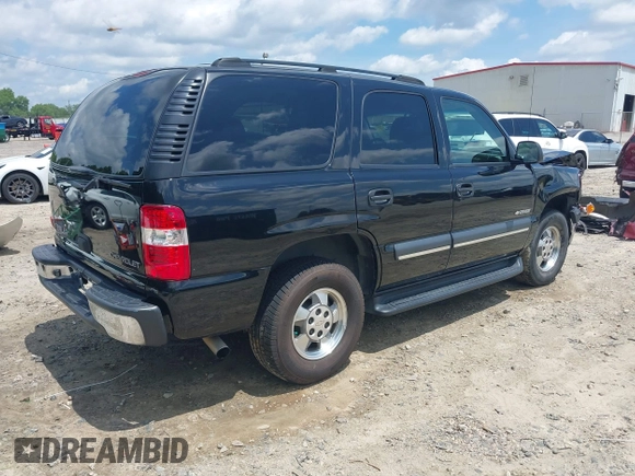 2003 Chevrolet Tahoe LS with VIN 1GNEC13V03R315463, listed as a IAAI auction lot 42518427 with 155,629 mi miles and . Bid and sale history available at DreamBid. Image 4.