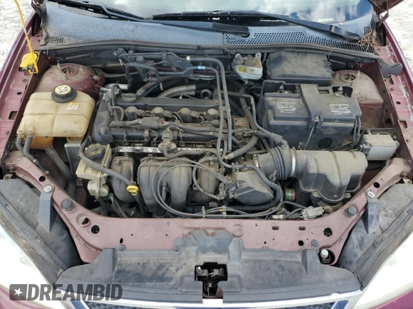 2006 Ford Focus S z VIN 1FAFP34N36W171785, wystawiony jako Copart lot #55815195 z przebiegiem 164 074 mil mil oraz Szkoda całkowita • Salvage title. Historia ofert i sprzedaży dostępna na DreamBid. Obrazek 11.