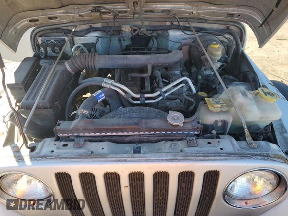2003 Jeep Wrangler Rubicon z VIN 1J4FA69SX3P301962, wystawiony jako Copart lot #79928744 z przebiegiem Nie podano mil oraz Czysty tytuł • Clean title. Historia ofert i sprzedaży dostępna na DreamBid. Obrazek 11.