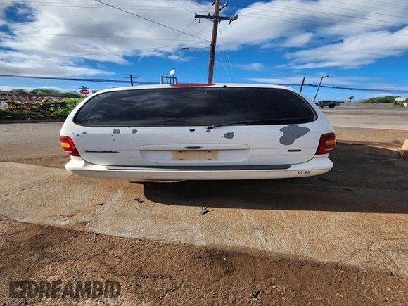 1998 Ford Windstar GL z VIN 2FMZA51U9WBD30693, wystawiony jako Copart lot #80142064 z przebiegiem 159 191 mil mil oraz Szkody całkowita. Historia ofert i sprzedaży dostępna na DreamBid. Obrazek 6.
