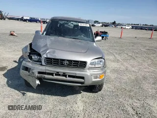 1999 Toyota RAV4 with VIN JT3GP10V5X7053634, listed as a Copart auction lot 52761695 with 236,443 mi miles and Salvage title. Bid and sale history available at DreamBid. Image 12.