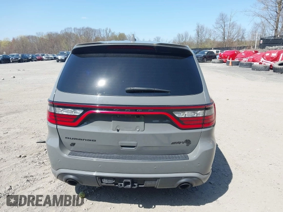 2021 Dodge Durango SRT Hellcat z VIN 1C4SDJH93MC683029, wystawiony jako IAAI lot #41875129 z przebiegiem 31 063 mil mil oraz . Historia ofert i sprzedaży dostępna na DreamBid. Obrazek 16.