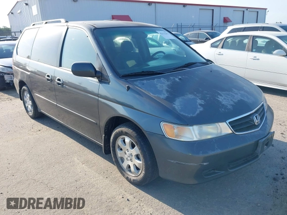 2003 Honda Odyssey EX with VIN 5FNRL18673B112958, listed as a IAAI auction lot 42172282 with 189,521 mi miles and . Bid and sale history available at DreamBid. Image 1.
