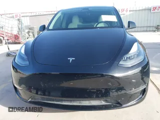 2022 Tesla Model Y Performance with VIN 7SAYGDEF6NF532027, listed as a IAAI auction lot 41717662 with 36,537 mi miles and . Bid and sale history available at DreamBid. Image 13.