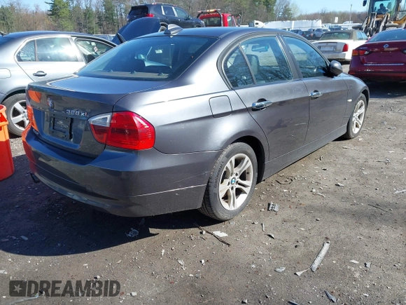 2008 BMW 3 Series 328xi with VIN WBAVC93518K043073, listed as a IAAI auction lot 42134507 with 148,712 mi miles. Bid and sale history available at carsss.com. Image 4.