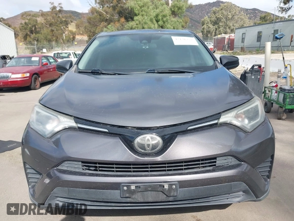 2017 Toyota RAV4 LE with VIN 2T3ZFREV6HW395050, listed as a IAAI auction lot 42136752 with 202,270 mi miles and . Bid and sale history available at carsss.com. Image 12.