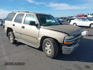 2005 Chevrolet Tahoe LS with VIN 1GNEC13V75R203875, listed as a IAAI auction lot 42163885 with 171,687 mi miles and . Bid and sale history available at DreamBid. Image 1.