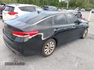 2018 Kia Optima LX z VIN 5XXGT4L33JG270472, wystawiony jako IAAI lot #42292416 z przebiegiem 60 064 mil mil oraz . Historia ofert i sprzedaży dostępna na DreamBid. Obrazek 4.