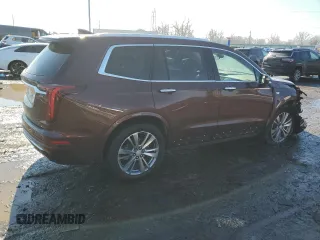 2023 Cadillac XT6 AWD Premium Luxury z VIN 1GYKPDRS0PZ112068, wystawiony jako Copart lot #46538575 z przebiegiem 52 016 mil mil oraz Szkoda całkowita • Salvage title. Historia ofert i sprzedaży dostępna na DreamBid. Obrazek 3.