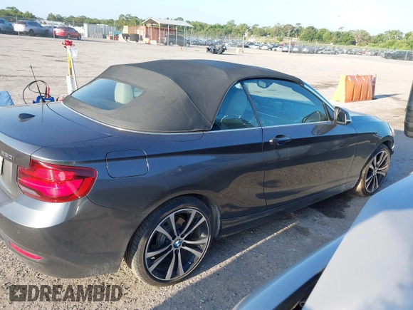 2020 BMW 2 Series 230i xDrive with VIN WBA2K1C08L7G28887, listed as a IAAI auction lot 42122785 with 30,599 mi miles and . Bid and sale history available at carsss.com. Image 13.