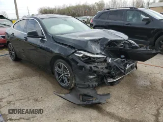 2021 BMW 2 Series 228i xDrive with VIN WBA73AK00M7H32960, listed as a Copart auction lot 52205695 with 39,240 mi miles and Salvage title. Bid and sale history available at DreamBid. Image 4.