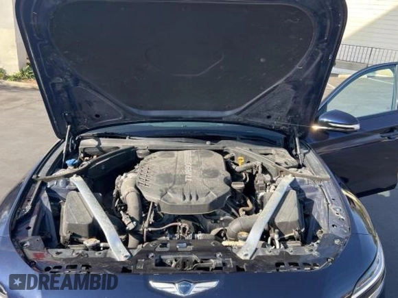 2023 Genesis G70 3.3T with VIN KMTG54TE6PU106021, listed as a Copart auction lot 86750284 with 8,669 mi miles and Salvage Title. Bid and sale history available at DreamBid. Image 7.