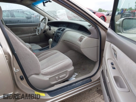 2001 Toyota Avalon XL z VIN 4T1BF28B41U172837, wystawiony jako IAAI lot #42350664 z przebiegiem 150 111 mil mil oraz . Historia ofert i sprzedaży dostępna na DreamBid. Obrazek 5.