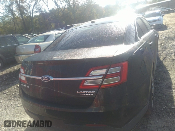 2014 Ford Taurus Limited with VIN 1FAHP2F80EG101504, listed as a IAAI auction lot 40974783 with 177,522 mi miles. Bid and sale history available at carsss.com. Image 16.