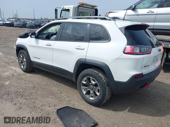 2019 Jeep Cherokee Trailhawk Elite with VIN 1C4PJMBX4KD351261, listed as a IAAI auction lot 41944727 with 97,849 mi miles. Bid and sale history available at carsss.com. Image 3.