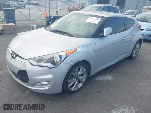 2016 Hyundai Veloster with VIN KMHTC6AD8GU301395, listed as a IAAI auction lot 42634620 with 115,551 mi miles and . Bid and sale history available at DreamBid. Image 2.