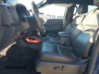 2023 Nissan Frontier Pro-4X z VIN 1N6ED1EK0PN610517, wystawiony jako Copart lot #87213324 z przebiegiem 51 648 mil mil oraz Szkoda całkowita • Salvage title. Historia ofert i sprzedaży dostępna na DreamBid. Obrazek 7.