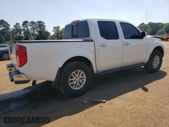2016 Nissan Frontier S with VIN 1N6AD0EV4GN774095, listed as a Copart auction lot 51939555 with 218,471 mi miles and Salvage title. Bid and sale history available at DreamBid. Image 3.