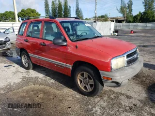 2003 Chevrolet Tracker z VIN 2CNBE13CX36943395, wystawiony jako Copart lot #70964574 z przebiegiem 118 975 mil mil oraz Szkody całkowita. Historia ofert i sprzedaży dostępna na DreamBid. Obrazek 4.