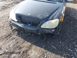 2004 Mercedes-Benz S-Class 5.0L with VIN WDBNG75J24A414813, listed as a IAAI auction lot 41911565 with 999,999 mi miles. Bid and sale history available at carsss.com. Image 6.