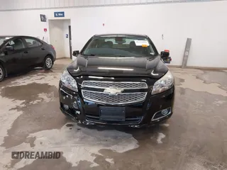 2013 Chevrolet Malibu LTZ with VIN 1G11H5SA1DU129095, listed as a IAAI auction lot 41556006 with 170,477 mi miles and . Bid and sale history available at DreamBid. Image 12.