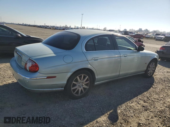 2003 Jaguar S-Type with VIN SAJEA01T93FM46260, listed as a Copart auction lot 87573835 with 129,563 mi miles and Clean Title. Bid and sale history available at DreamBid. Image 3.