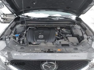 2019 Mazda CX-5 Touring with VIN JM3KFBCM7K0583582, listed as a IAAI auction lot 41634349 with 33,709 mi miles. Bid and sale history available at carsss.com. Image 10.
