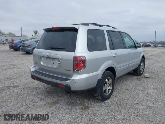 2007 Honda Pilot EX with VIN 5FNYF18457B009707, listed as a IAAI auction lot 42030214 with 229,462 mi miles. Bid and sale history available at carsss.com. Image 4.