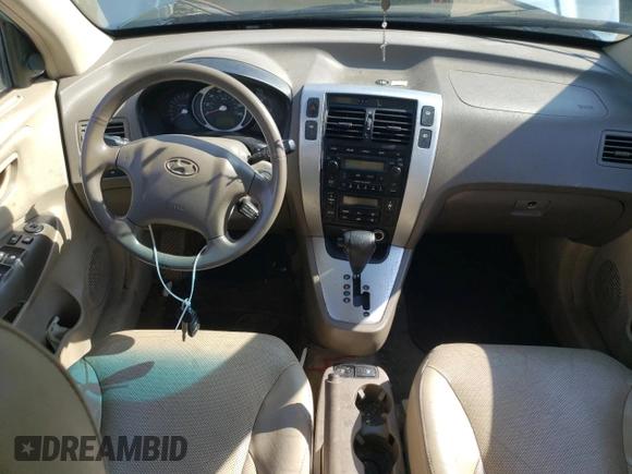 2006 Hyundai Tucson GLS with VIN KM8JN72D96U270906, listed as a Copart auction lot 54379205 with 235,973 mi miles and Salvage Title. Bid and sale history available at carsss.com. Image 8.