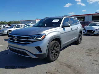 2022 Volkswagen Atlas SE z VIN 1V2HR2CA9NC518394, wystawiony jako IAAI lot #41702134 z przebiegiem 28 685 mil mil oraz . Historia ofert i sprzedaży dostępna na DreamBid. Obrazek 12.
