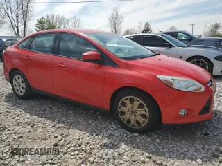 2012 Ford Focus SE with VIN 1FAHP3F23CL234716, listed as a Copart auction lot 55239455 with 165,233 mi miles and Clean Title. Bid and sale history available at DreamBid. Image 4.