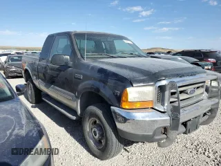 1999 Ford F-250 XL with VIN 1FTNX21L0XED19451, listed as a Copart auction lot 65787795 with 140,812 mi miles and Clean title. Bid and sale history available at DreamBid. Image 4.