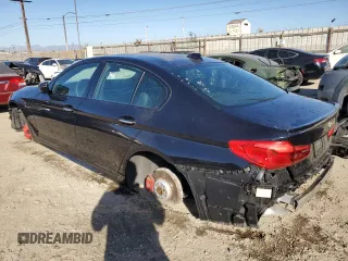 2018 BMW 5 Series 540i with VIN WBAJE5C52JWA95279, listed as a Copart auction lot 88995395 with Not provided miles and Salvage title. Bid and sale history available at DreamBid. Image 2.