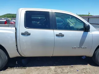 2007 Nissan Titan XE with VIN 1N6AA07AX7N231823, listed as a IAAI auction lot 42300587 with 210,735 mi miles and . Bid and sale history available at DreamBid. Image 13.