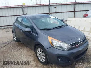 2013 Kia Rio SX with VIN KNADN5A39D6302606, listed as a IAAI auction lot 41790644 with 145,872 mi miles. Bid and sale history available at carsss.com. Image 1.