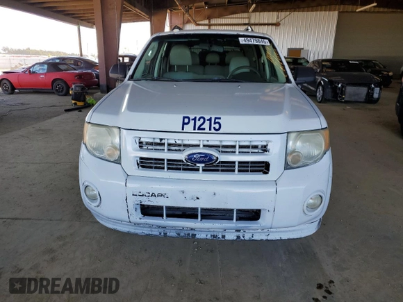 2011 Ford Escape Hybrid z VIN 1FMCU4K34BKC19594, wystawiony jako Copart lot #49479845 z przebiegiem 399 809 mil mil oraz Szkoda całkowita • Salvage title. Historia ofert i sprzedaży dostępna na DreamBid. Obrazek 5.
