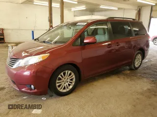 2014 Toyota Sienna XLE z VIN 5TDYK3DC5ES525451, wystawiony jako Copart lot #56144285 z przebiegiem 195 495 mil mil oraz Szkoda całkowita • Salvage title. Historia ofert i sprzedaży dostępna na DreamBid. Obrazek 1.