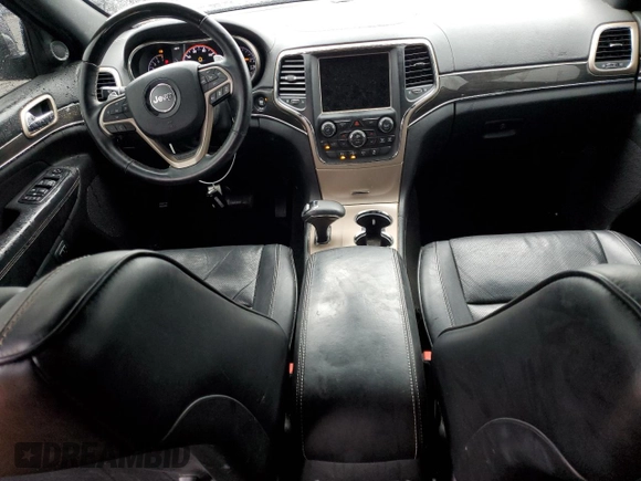 2015 Jeep Grand Cherokee Overland with VIN 1C4RJFCG7FC925995, listed as a Copart auction lot 85421214 with 142,266 mi miles and Salvage Title. Bid and sale history available at carsss.com. Image 8.