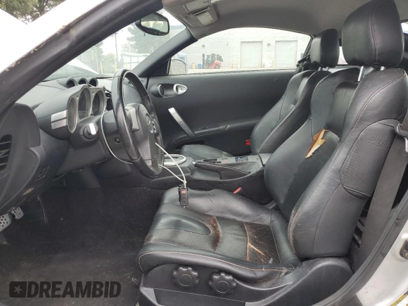 2004 Nissan 350Z Touring z VIN JN1AZ34E44T061263, wystawiony jako Copart lot #55530795 z przebiegiem 126 215 mil mil oraz Czysty tytuł • Clean title. Historia ofert i sprzedaży dostępna na DreamBid. Obrazek 7.