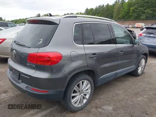 2012 Volkswagen Tiguan SE z VIN WVGAV7AX9CW000568, wystawiony jako IAAI lot #42322456 z przebiegiem 175 453 mil mil oraz . Historia ofert i sprzedaży dostępna na DreamBid. Obrazek 4.